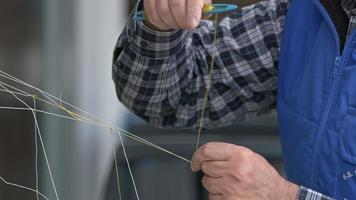 Fisherman is Repairing Fishnet
