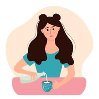 mujer joven está desayunando. la chica está sentada a la mesa y vierte leche en una taza de té. vector