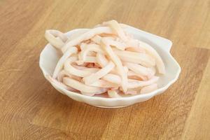 Marinated squid strips in the bowl photo