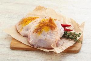 Raw chicken thigh for cooking