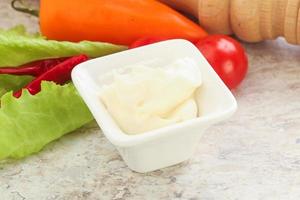 Organic mayonnaise sauce in the bowl photo