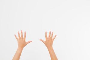 Two close woman hands isolated on white background. Copy space. photo