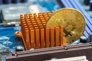 Gold Bitcoin electronic computer processor board photo