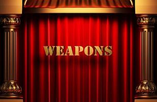 weapons golden word on red curtain photo