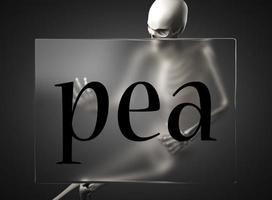 pea word on glass and skeleton photo