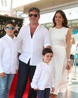 LOS ANGELES  AUG 22, Adam Silverman, Simon Cowell, Eric Cowell, Lauren Silverman at the Simon Cowell Star Ceremony on the Hollywood Walk of Fame on August 22, 2018 in Los Angeles, CA photo