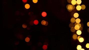 blured Weihnachtsgirlande beleuchtet abstrakten Hintergrund des Videos 4k. Platz kopieren