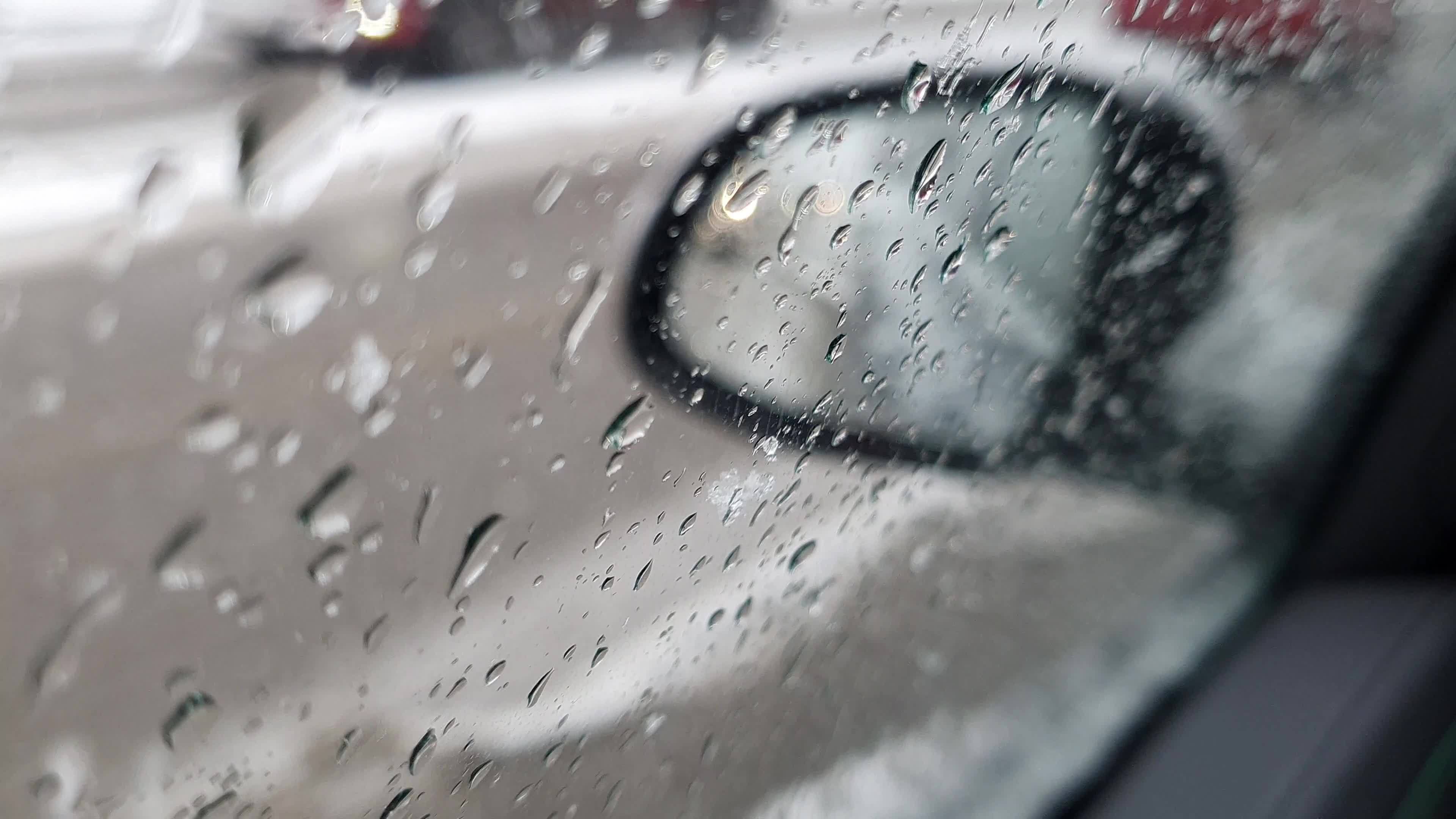 Rainy Day In A Car Rain Drops Flowing Down On A Car Window And Other Cars Passing By 7515353