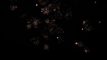 Christmas fireworks at night. 4k video abstract background. Copy space