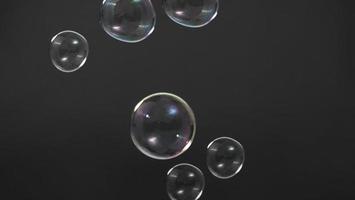 gota de pompas de jabón o burbujas de champú flotando como volando en el aire foto