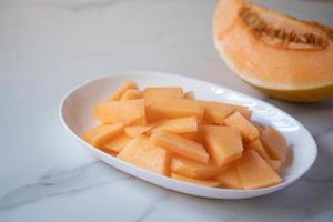 Fresh Japanese melon with orange pulp photo