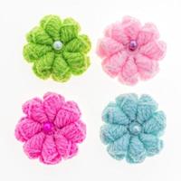 Handmade crochet flowers Isolated on white background. photo