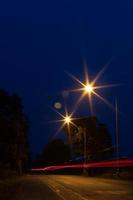 Lights, lanterns with tail lights on the road. photo