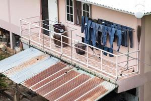 Jeans hanging the terrace home. photo