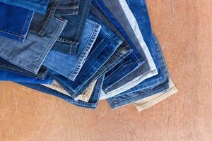 Lower Leg Jeans on a wooden floor. photo