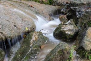 Water flooded on the rocks. photo