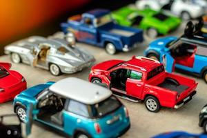 Close-up image of red pickup truck model toys. photo