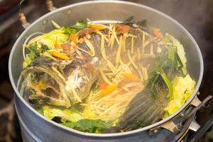 Snake fish with steamed vegetables. photo