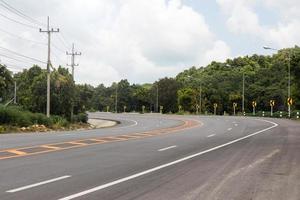 Curved road with tree. photo