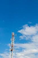 Telecommunications mast cloud sky. photo