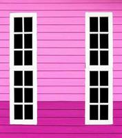 Long window white wood in the pink wall. photo