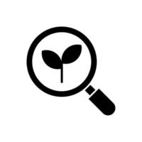 magnifying glass with plant leaf icon vector