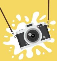 Hanging camera  on color  background copy space vector