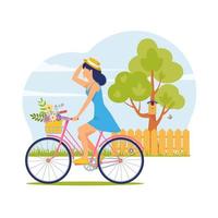 Young woman in hat and summer dress rides bicycle with basket of flowers. Bike ride against sky on village street. Concept of summer holidays. Healthy lifestyle vector