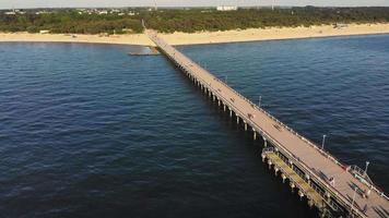 Birds eye view famous tourist destination - Palanga pier with city panorama in baltic country Lithuania. Summer holiday vacation in Eastern Europe. video