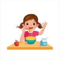 linda niña comiendo fideos deliciosos usando palillos mostrando gestos de signos bien vector