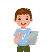 cute little boy holding and using digital tablet touching screen browsing internet, doing homework, and playing games. Kids and electronic gadget devices concept for children vector