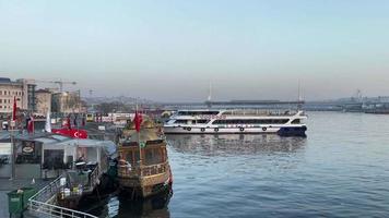 istanbul,Turkey.April 14,2022.Istanbul old city view from Galata Bridge in the early morning and sunrise in spring season for travel and tourism. video