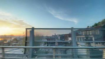istanbul,Turkey.April 15,2022. Istanbul old city view from the Golden Horn Metro bridge and inside the metro train at sunrise and early morning.