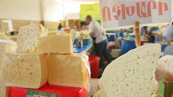 Close up view home made various cheeses on stalls in local market in Vanadzor, Armenia video