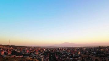 Panoramic wide Yerevan city center views from cascade complex on sunset in summer video