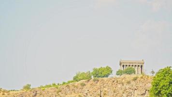 Static time lapse Garni temple up hill. Roman - Greek architecture heritage in Armenia.