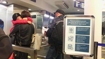 Vilnius, Lithuania , 2021 - Tourist waiting in queue at check point in airport entering country. Pandemic travel regulations video