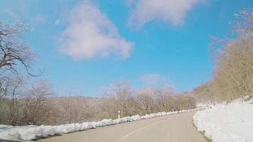 Front window point of view fast motion travel hyperlapse Georgia countryside winter road video