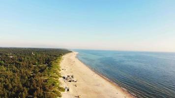 Descending aerial view Palanga holiday resort in Lithuania beach holiday vacation. video
