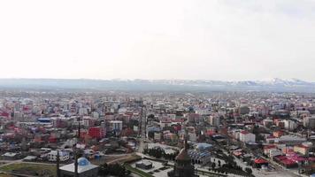 Aerial panning view Kars mosque with city panorama in eastern Turkiye