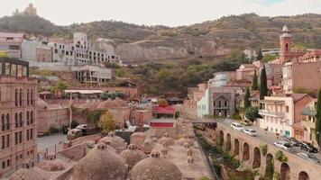 Tbilisi, Georgia-15th october, 2020. Rising view of Royal baths domes and old tbilisi buildings exterior.Tourism during pandemic in caucasus video