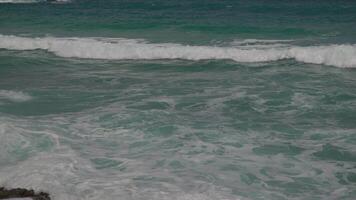 Close up of Disturbed blue ocean water waves surface. Beautiful background with copy space. Environmental problems, lack of drinking water, climate change, drought, global warming concept. video