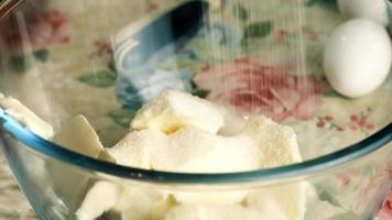 Kneading dough with hand electric mixer. Process of beating the dough using an electric mixer. video