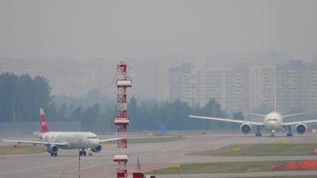 Planes on the runway, traffic video