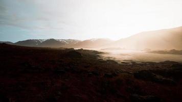 Beautiful view of foggy mountains with a reflection in a lake video