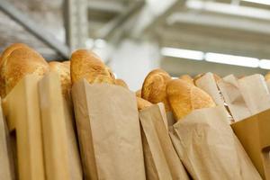 Fresh baked bread in supermarket. Fresh delicious food. Bakery.Top view. Mock up.Copy space. Selective focus. Summer bread. photo