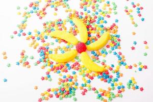 Colorful candy, lollipop and sweets isolated on white background. Top view. Selective focus. photo