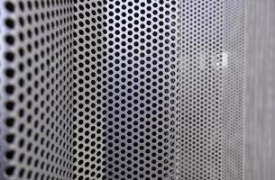 Metal wall with holes photo