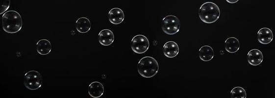 Soap bubble drop or Shampoo bubbles floating like flying in the air photo