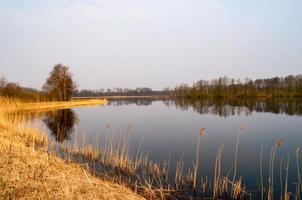 lake in the landscape in autumn photo